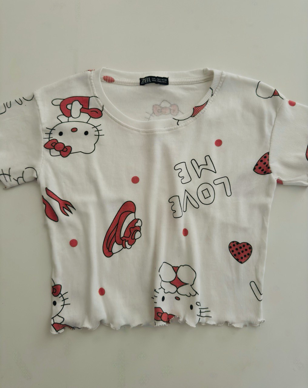 کراپ تیشرت طرحدار لبه چین ۸